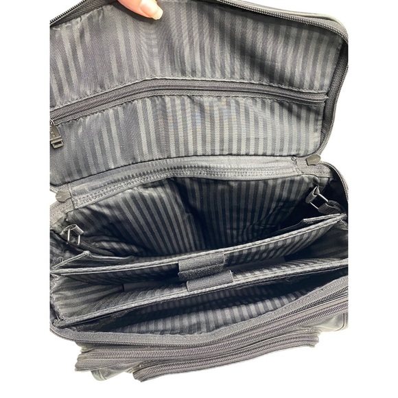 Tumi Black leather Backpack with Adjustable Straps and Durable Design - Picture 7 of 13